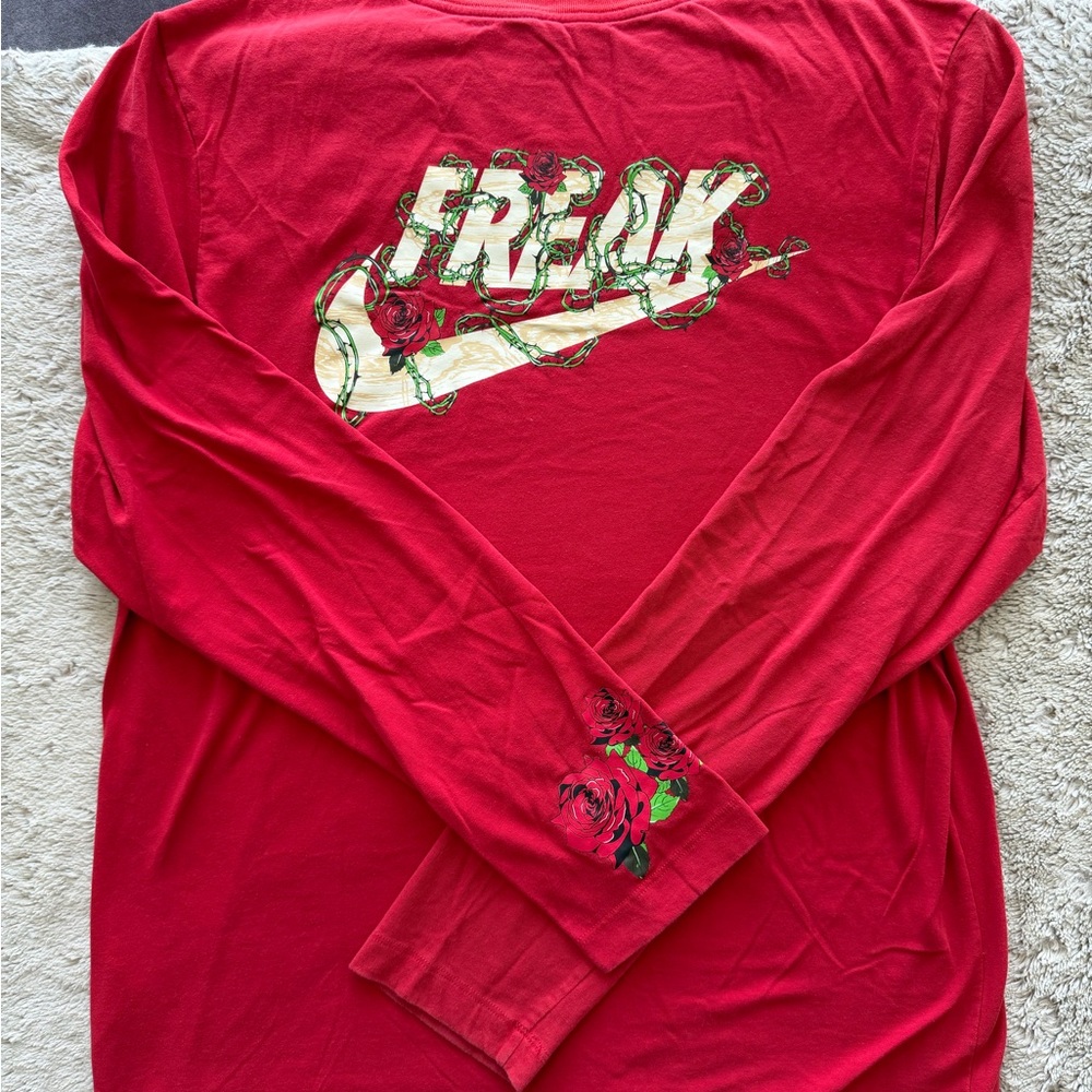 Nike Red Long-Sleeve Graphic Tee with Floral Logo